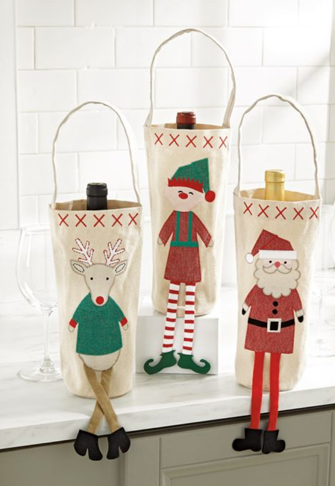 https://monogram-market.com/cdn/shop/products/mud-pie-christmas-character-dangle-leg-wine-bag_jpg_684x.png?v=1660341214